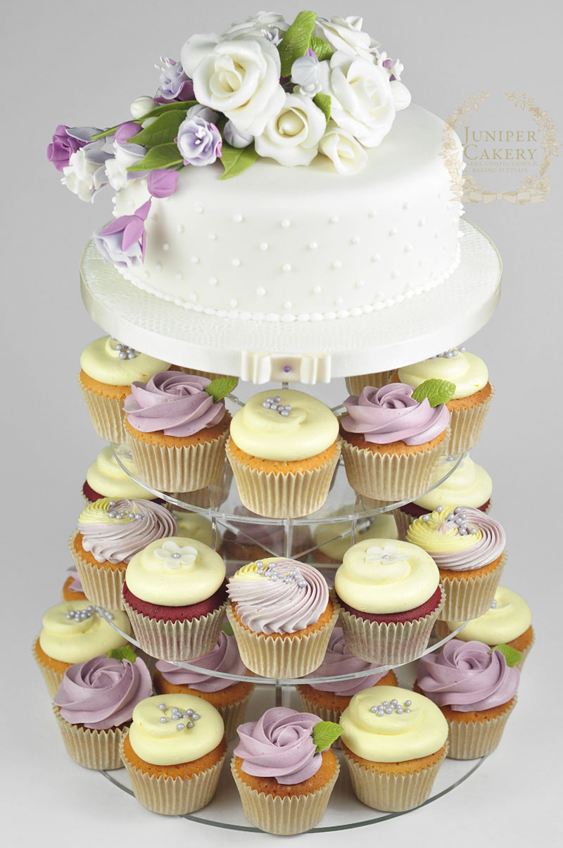 Sweet rose and fuchsia cupcake and cake wedding tower by Juniper Cakery