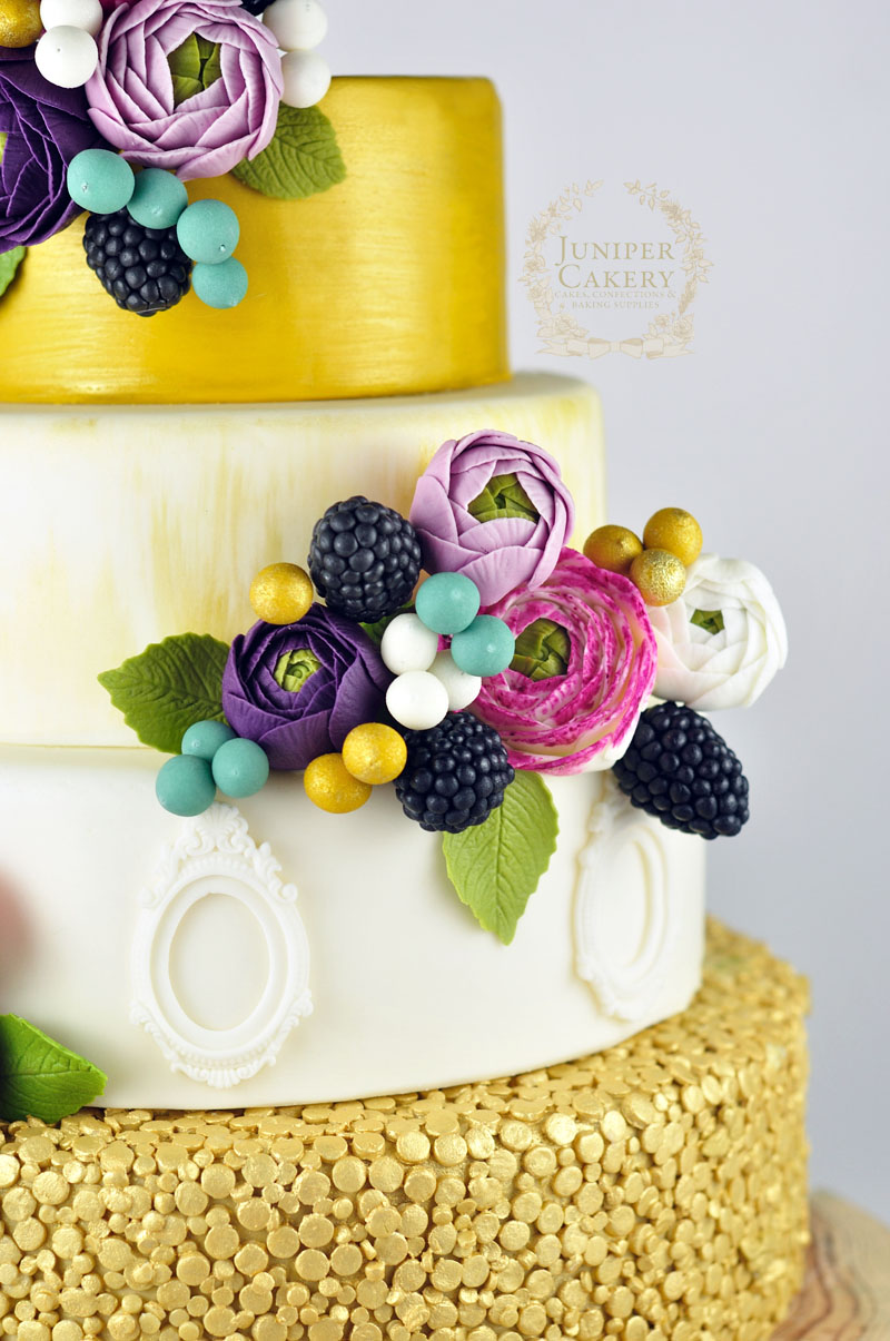 Lovely purple ranunculus cake by Juniper Cakery