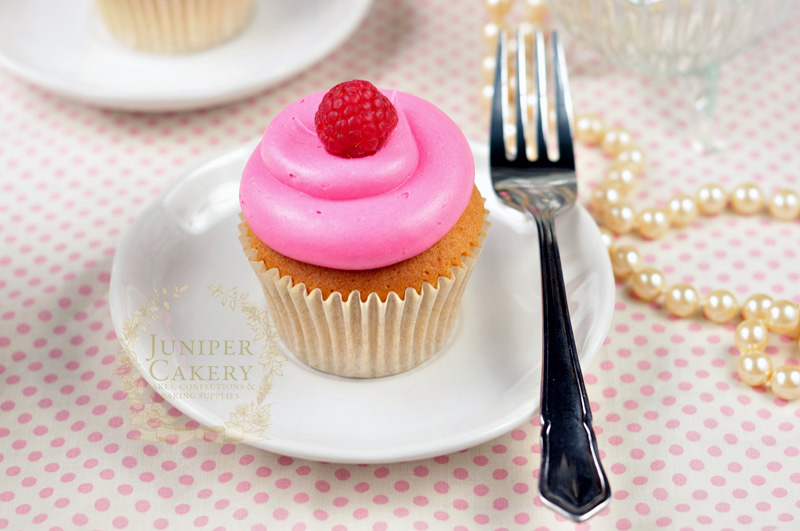 Raspberry jam filled cupcake by Juniper Cakery