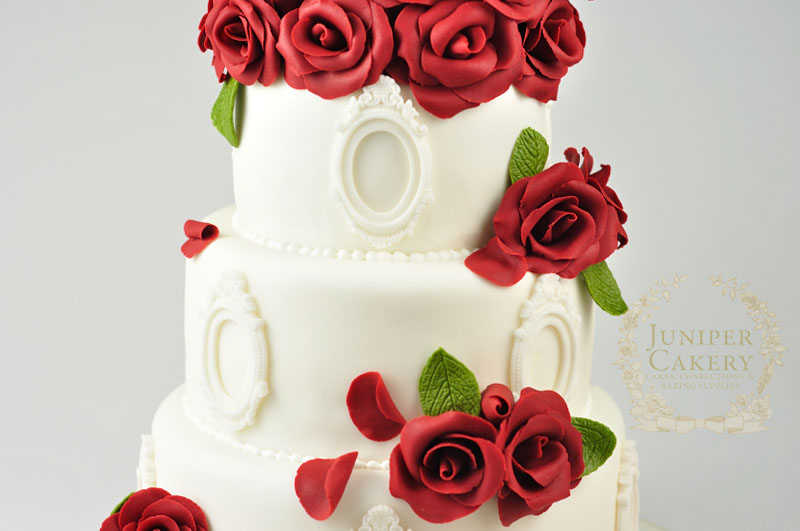 Beautiful red rose wedding cake by Juniper Cakery