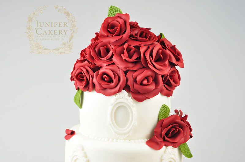 Red rose wedding cake made by Juniper Cakery