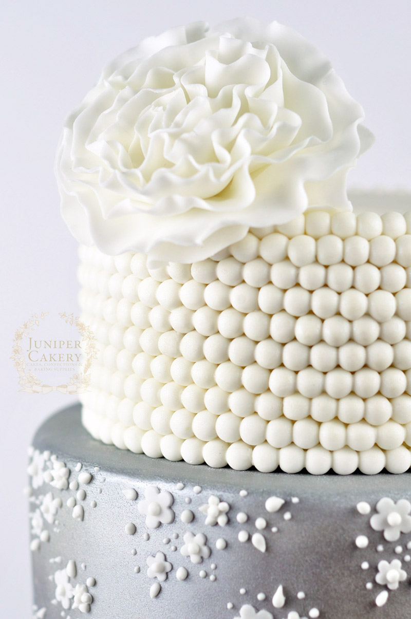 Pretty lace wedding cake by Juniper Cakery