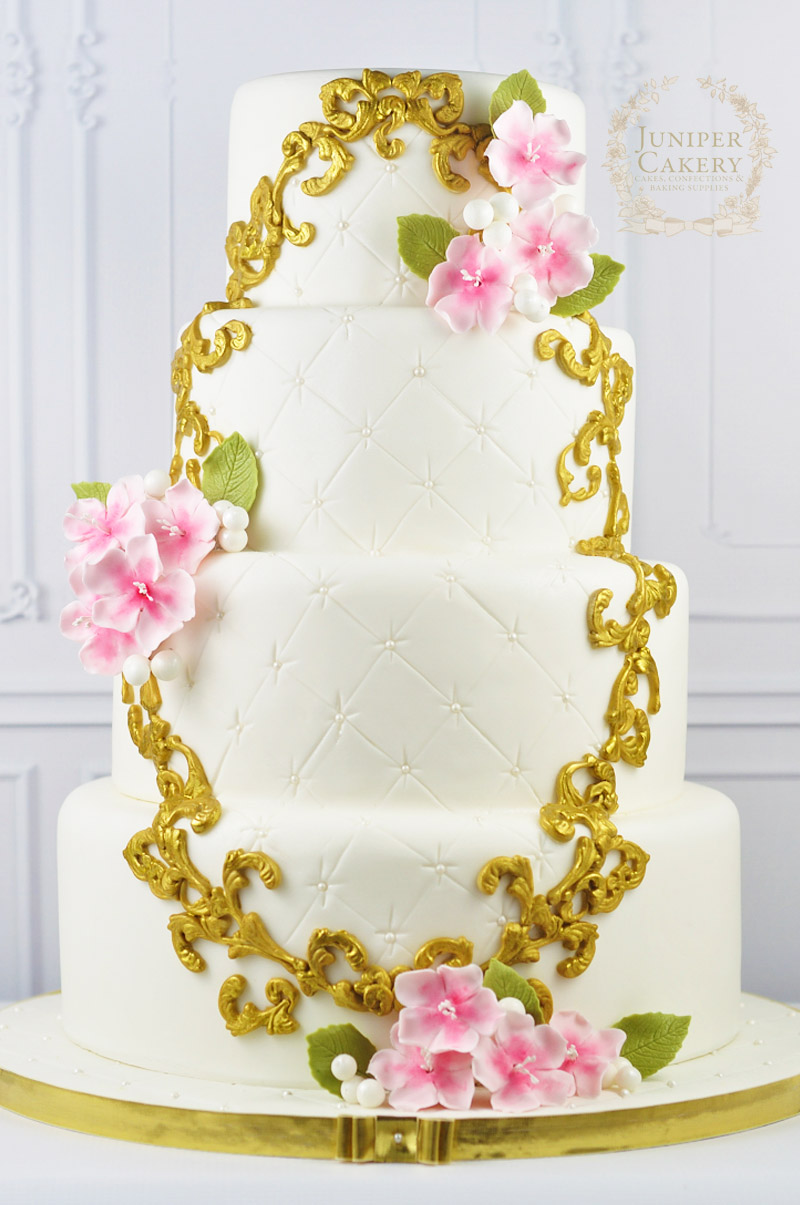 Lovely cherry blossom four tier wedding cake by Juniper Cakery