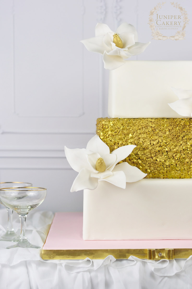 Magnolia and Sequin Wedding Cake by Juniper Cakery