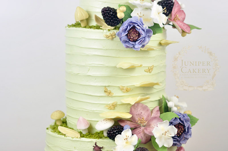 Woodland wedding cake hellebores and damson blossoms by Juniper Cakery