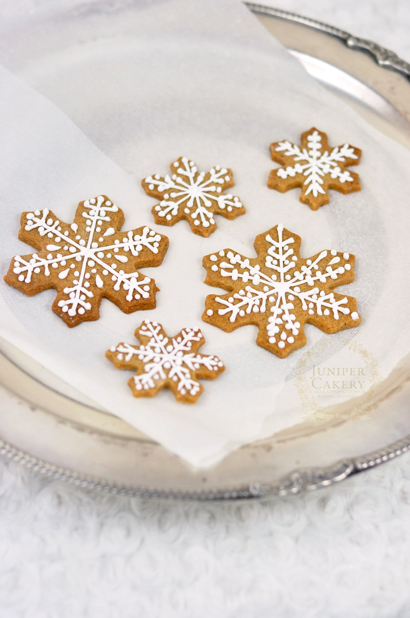 Make some gingerbread snowflake cookies with this recipe by Juniper Cakery