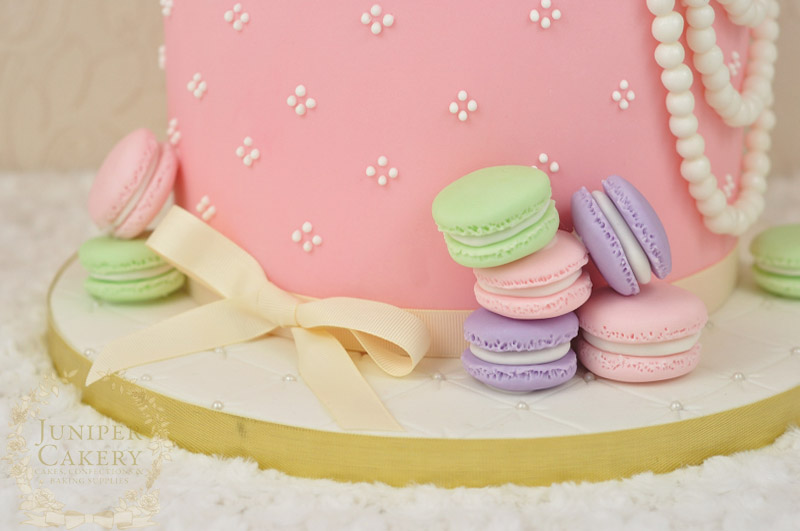 Tea and macarons themed cake with gum paste rabbit in teacup by Juniper Cakery