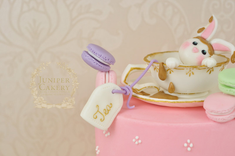 Cute tea drenched fondant rabbit topped cake by Juniper Cakery