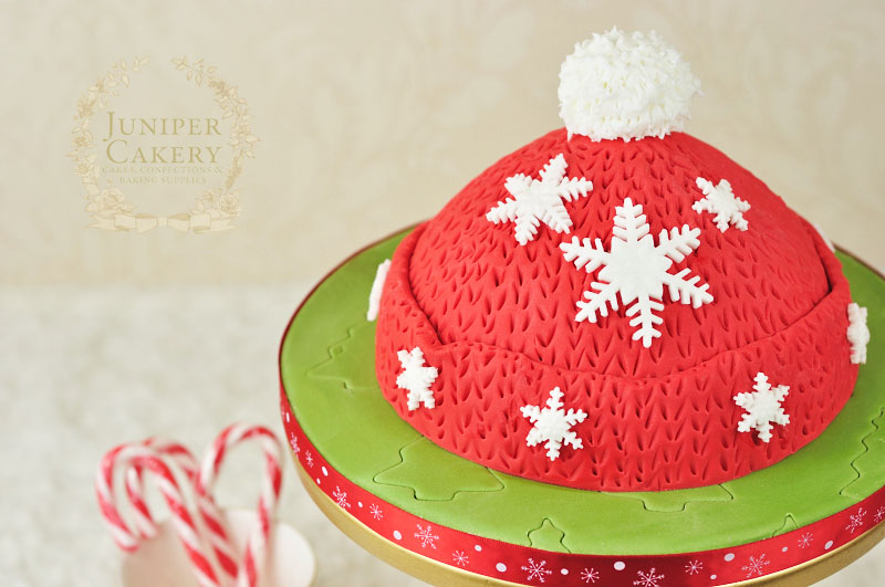 Fun and festive woolly hat cake tutorial by Juniper Cakery