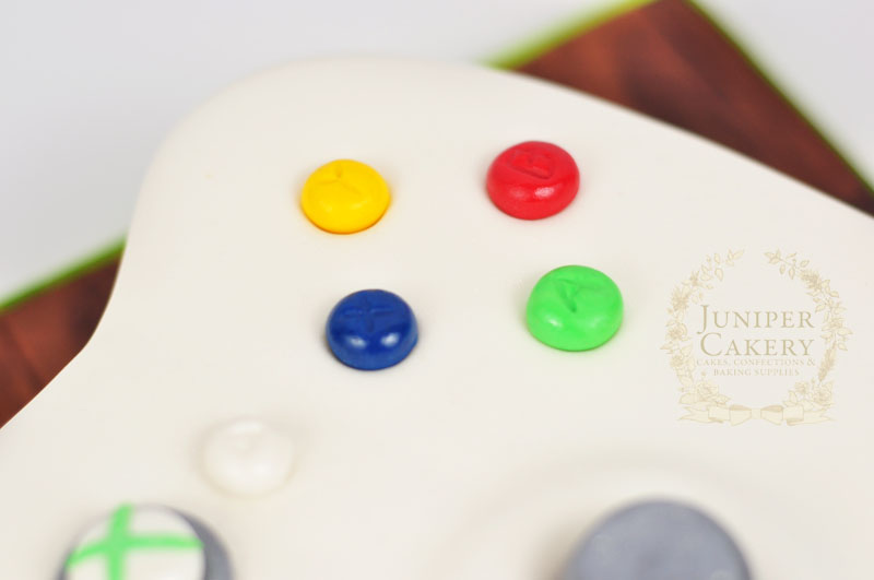 Close up detail of giant xbox controller cake by Juniper Cakery