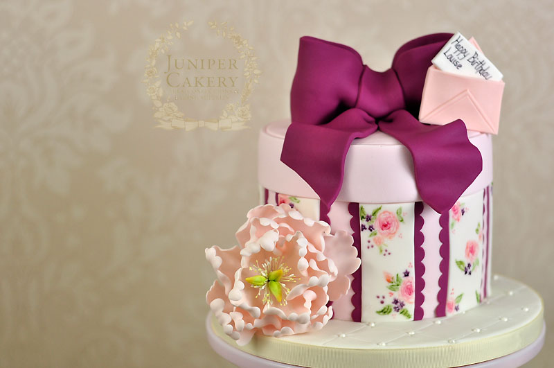 Hand-painted floral hat box cake by Juniper Cakery