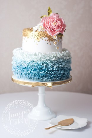 Super pretty ruffled wedding cake with sugar flowers by Juniper Cakery