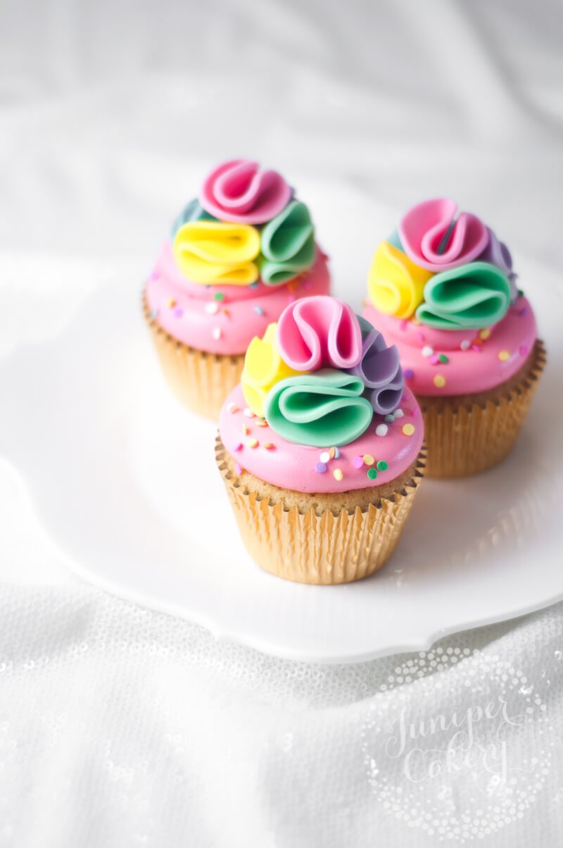 Cute rainbow cupcakes by Juniper Cakery