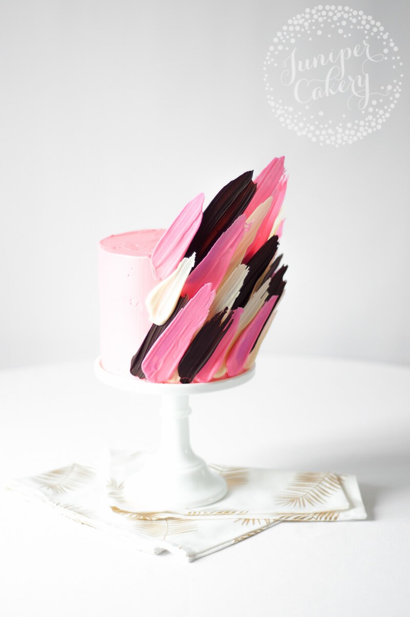 Chocolate and candy melt brushstroke cake by Juniper Cakery