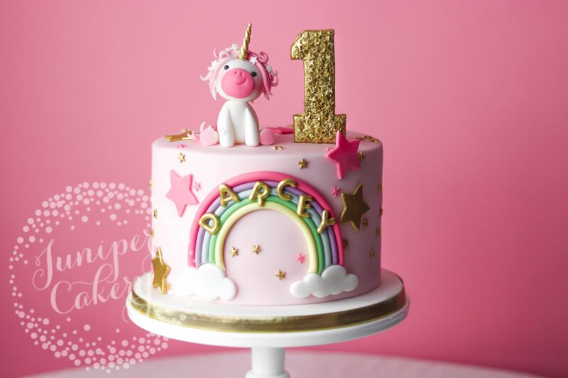 Pink unicorn cake with stars by Juniper Cakery