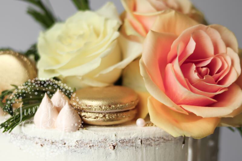 Floral detail on a semi-naked cake by Juniper Cakery