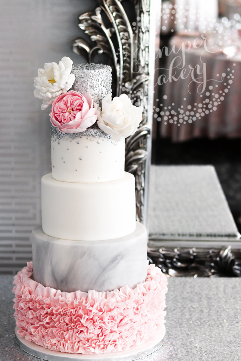 Glam pink ruffle and grey marble wedding cake by Juniper Cakery