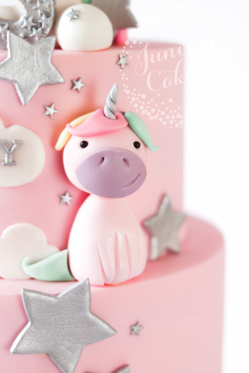 Pale rainbow unicorn party cake by Juniper Cakery