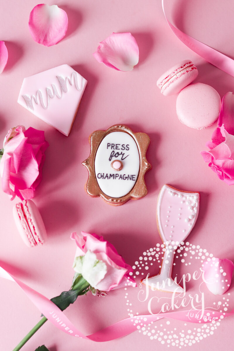 Pretty in pink Mother's Day cookies by Juniper Cakery